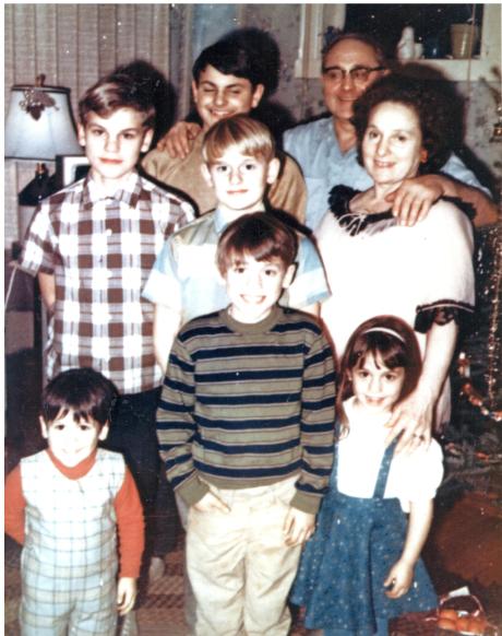 Christmas at Johnny and Katie Torlai's house. The boys are my brothers. I am the girl. I am guessing the year was 1969.